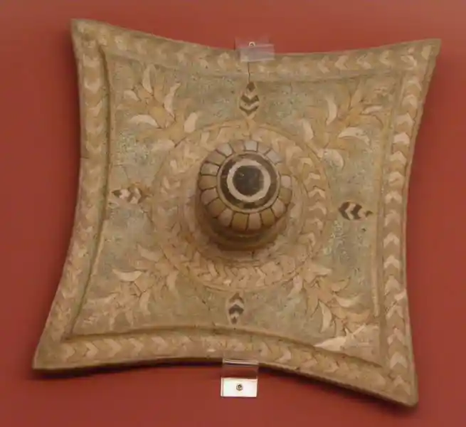 Four-pointed cross engraved on glazed brick wall decorations with inscription offered by Assurnasirpal II